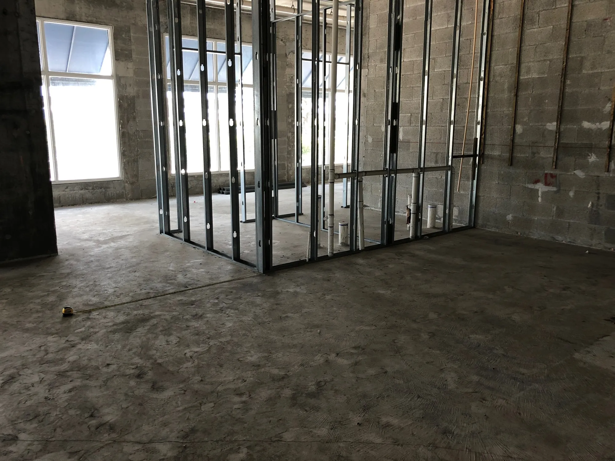 Steel stud framing for an interior room inside a commercial shell space