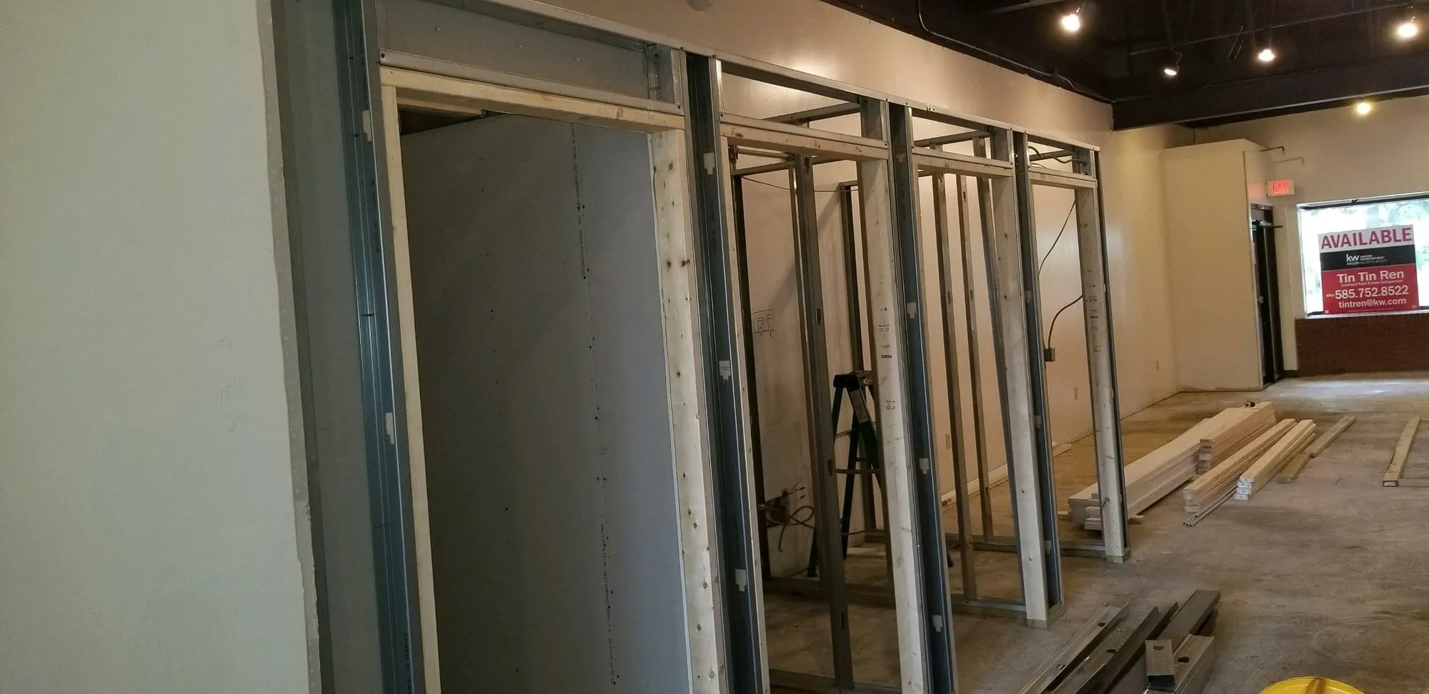 Metal stud framing and scaffolding during a commercial interior fit-out
