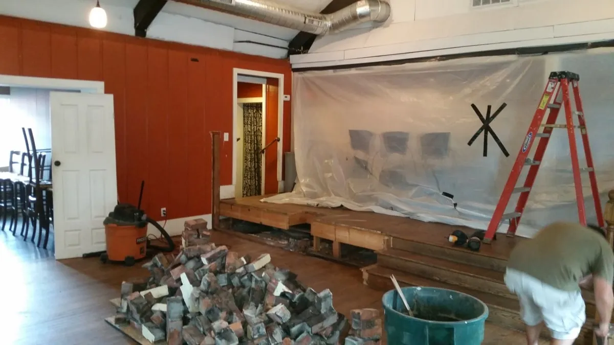 Commercial space with protective sheeting during an occupied renovation