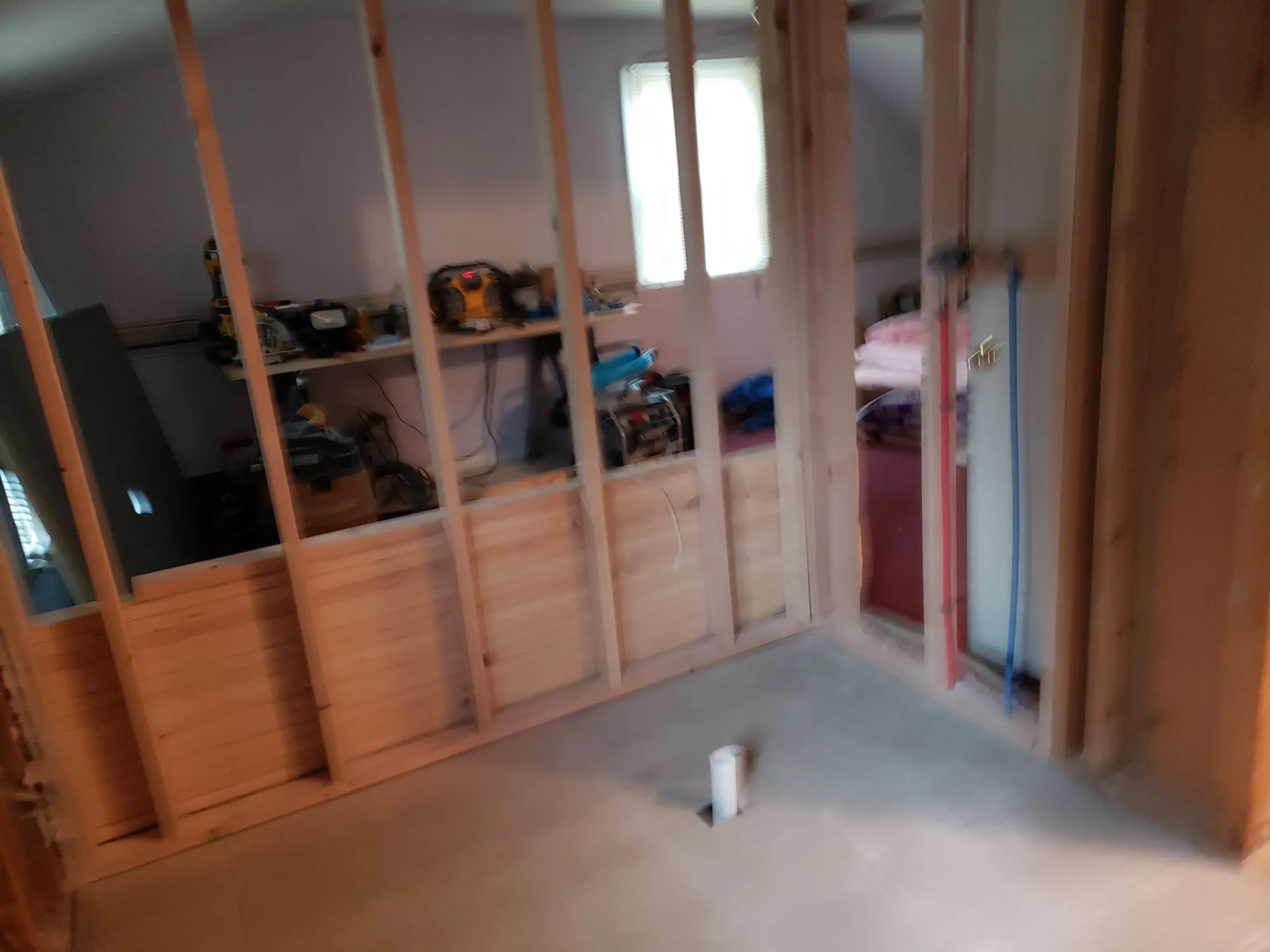 Framed bathroom wall with a new window opening