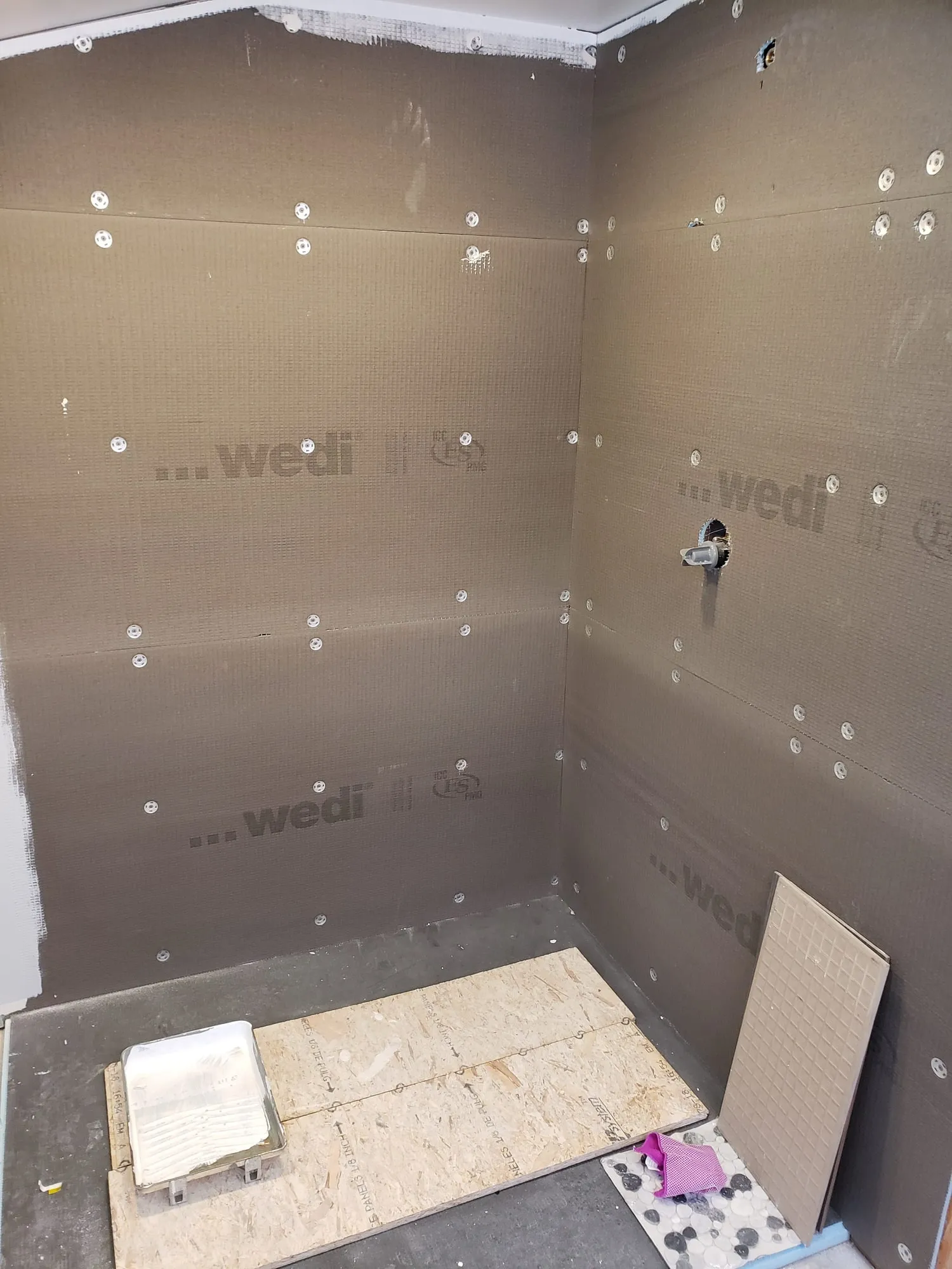 Waterproof shower backer board installed and ready for tile