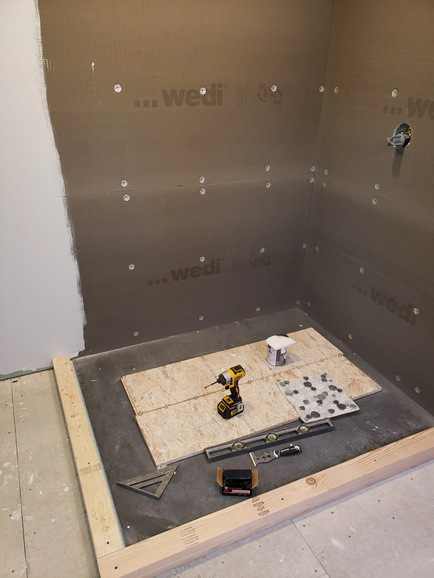 Shower pan framed and waterproofed before tiling begins
